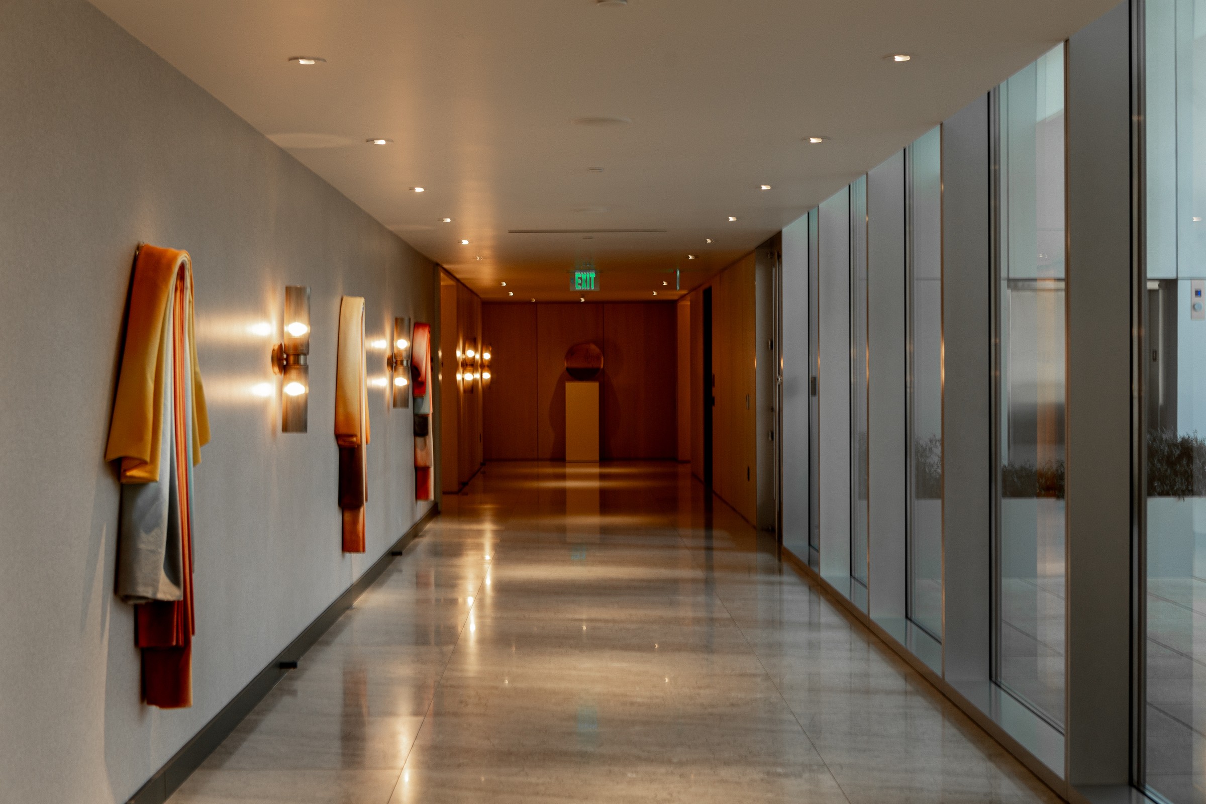 Corridor, fabric drapes on wall, wide