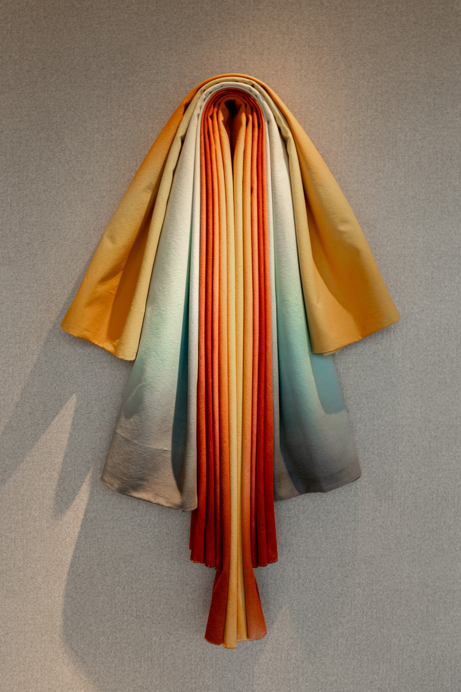 Draped sculpture, yellow and blue
