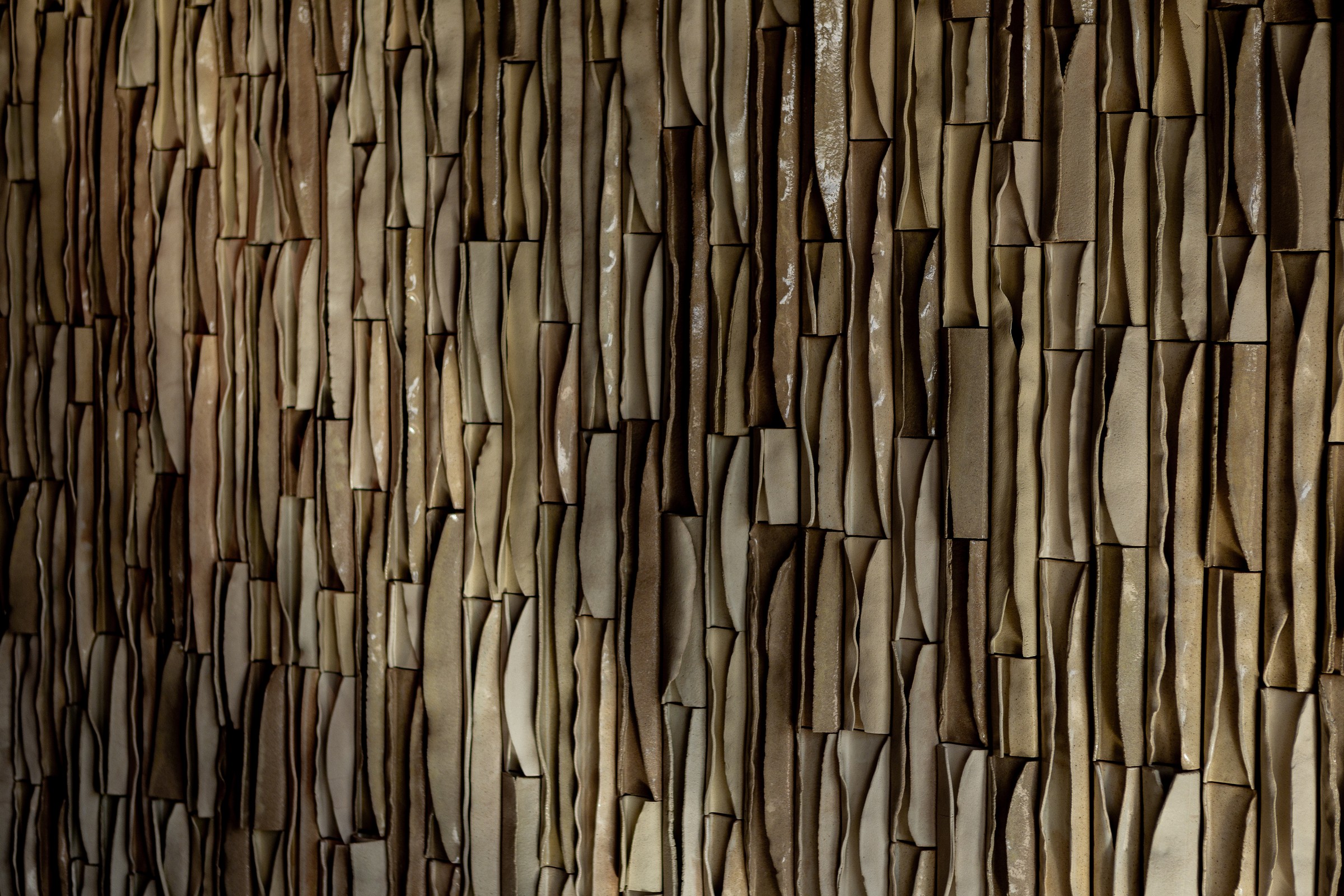Ribbed wall panel, warm lit