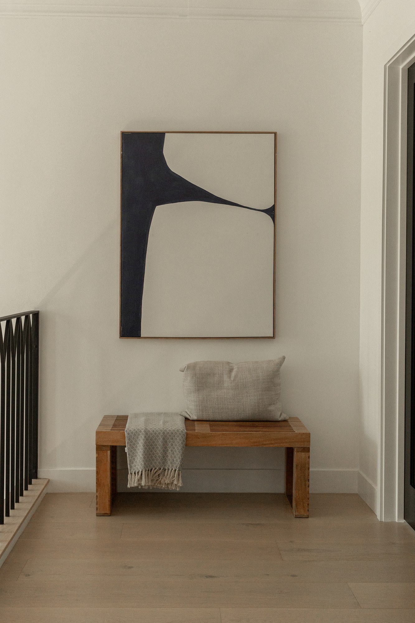 Entry hallway, art and bench