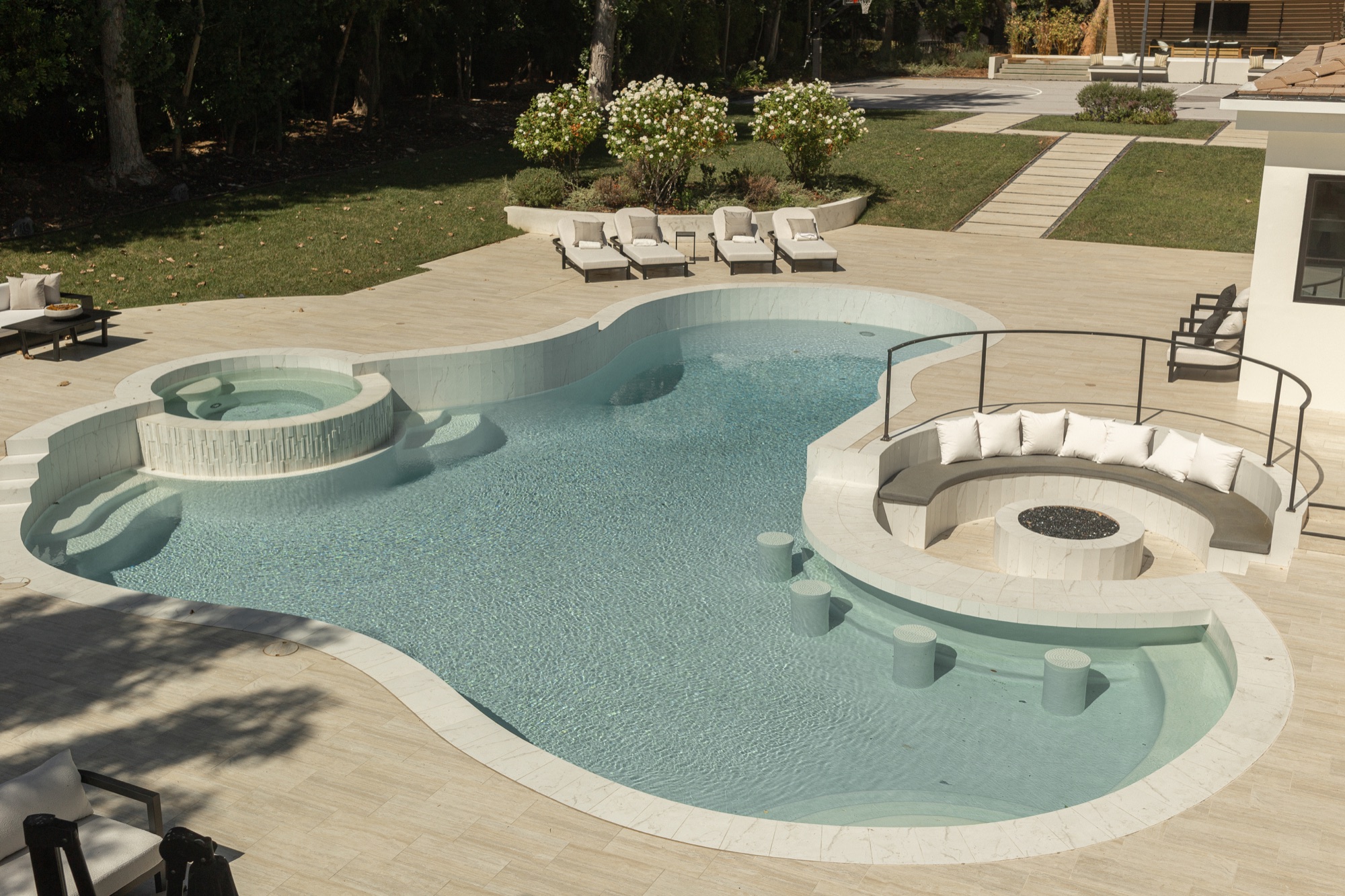 Pool, spa and sunken fire lounge seating